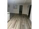 Living room or hallway with light wood floors at 3785 Somerset Sw Dr, Marietta, GA 30064