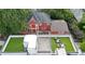 An aerial view of a renovated home, with a modern rooftop patio, wooden deck, and views of the neighborhood at 536 Highland Ne Ave # A, Atlanta, GA 30312