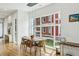 Bright dining room featuring hardwood floors and expansive windows with neighborhood views at 536 Highland Ne Ave # A, Atlanta, GA 30312