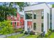 Modern home with large windows, wood accents, and a well-manicured lawn at 536 Highland Ne Ave # A, Atlanta, GA 30312