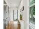 Bright hallway with hardwood floors, modern doors, and a view to the outside at 536 Highland Ne Ave # A, Atlanta, GA 30312