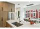 Spacious kitchen featuring a large island with quartz countertops and stainless steel appliances at 536 Highland Ne Ave # A, Atlanta, GA 30312