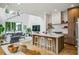 Spacious open concept kitchen and living room with a large island and modern appliances at 536 Highland Ne Ave # A, Atlanta, GA 30312