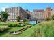 Picturesque view of Ponce City Market with lush green space and water feature at 536 Highland Ne Ave # A, Atlanta, GA 30312