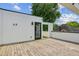 Rooftop patio with a wooden deck and doorway to the interior living space and views of the surrounding neighborhood at 536 Highland Ne Ave # A, Atlanta, GA 30312