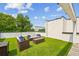 Relax on this rooftop patio, complete with modern outdoor furniture, lush green turf and views of the city at 536 Highland Ne Ave # A, Atlanta, GA 30312