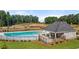 Community pool with an outdoor pavilion, perfect for relaxing on a hot summer day at 1410 Aura Ln, Lawrenceville, GA 30045