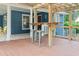 View of the back porch featuring a bar and bistro seating at 233 Oakridge Se Dr, Cartersville, GA 30121