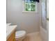 Bright bathroom features a shower and a window allowing natural light at 233 Oakridge Se Dr, Cartersville, GA 30121