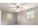 Cozy bedroom with two windows for natural light and soft carpet at 233 Oakridge Se Dr, Cartersville, GA 30121