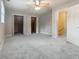 Large bedroom with soft carpet and several closets for ample storage at 233 Oakridge Se Dr, Cartersville, GA 30121