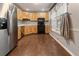Bright kitchen with wooden cabinets and stainless steel appliances at 233 Oakridge Se Dr, Cartersville, GA 30121