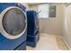 Laundry room with side by side washer and dryer and tile flooring at 233 Oakridge Se Dr, Cartersville, GA 30121