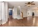 Bright living room features hardwood floors, stairs, and neutral paint at 233 Oakridge Se Dr, Cartersville, GA 30121