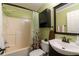 Bright bathroom with a shower and tub combination, vanity, and toilet at 2430 Tribble Creek Cv, Grayson, GA 30017