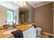 Bathroom with double sink vanity and granite countertop, offering elegance and practicality at 2430 Tribble Creek Cv, Grayson, GA 30017