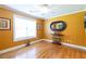 Bright bonus room with wood floors and stylish decor, offering a versatile space at 2430 Tribble Creek Cv, Grayson, GA 30017