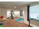 A functional basement exercise room provides space for fitness equipment and promotes a healthy lifestyle at 2430 Tribble Creek Cv, Grayson, GA 30017