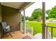 Enjoy the view from the cozy covered front porch, perfect for relaxing and unwinding at 2430 Tribble Creek Cv, Grayson, GA 30017