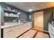 This basement kitchen offers ample counter space, modern appliances, and a functional design for everyday living at 2430 Tribble Creek Cv, Grayson, GA 30017