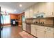 Well-appointed kitchen with ample cabinetry and stainless steel appliances at 2430 Tribble Creek Cv, Grayson, GA 30017