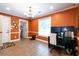 Bright home office with ample workspace, neutral floors, and plenty of natural light at 2430 Tribble Creek Cv, Grayson, GA 30017
