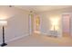 Bright bedroom with neutral carpet, ensuite bathroom, and walk-in closet at 2734 Peachtree Nw Rd # C-404, Atlanta, GA 30305