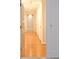 Hallway with hardwood floors with access to multiple rooms at 2734 Peachtree Nw Rd # C-404, Atlanta, GA 30305