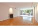 Bright living room with fireplace and sitting area with large windows at 2734 Peachtree Nw Rd # C-404, Atlanta, GA 30305
