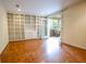 Spacious office features built-in bookshelves and natural light with a sunroom at 2734 Peachtree Nw Rd # C-404, Atlanta, GA 30305