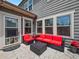 Outdoor seating with gray siding, an awning, and view of backyard at 5730 Arbor Green Cir, Sugar Hill, GA 30518