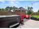 Backyard area with a hot tub and patio furniture at 5730 Arbor Green Cir, Sugar Hill, GA 30518
