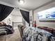 Entertainment room features a large TV, comfortable seating, and movie decor at 5730 Arbor Green Cir, Sugar Hill, GA 30518