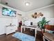 Cozy living space with ample room for a desk, a TV and views of the rest of the house at 5730 Arbor Green Cir, Sugar Hill, GA 30518