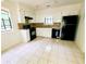 Functional kitchen with modern appliances and a window at 1225 Creek Forest Nw Ct, Conyers, GA 30012