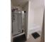 Bathroom with a glass-enclosed shower and a separate soaking tub at 1942 Dillon Dr, Lithonia, GA 30058