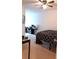 Bedroom with a ceiling fan and carpeted floors at 1942 Dillon Dr, Lithonia, GA 30058