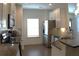 Bright and open kitchen featuring stainless steel appliances and beautiful granite countertops at 1942 Dillon Dr, Lithonia, GA 30058