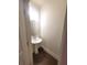 Half bathroom features a pedestal sink, oval mirror and clean, neutral walls at 1942 Dillon Dr, Lithonia, GA 30058