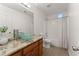 Bathroom featuring a glass vessel sink, granite countertop, and shower/tub combination at 2605 Fort Apachee Trl, Dacula, GA 30019