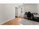 Bedroom featuring a desk, wardrobe, and hardwood flooring at 2605 Fort Apachee Trl, Dacula, GA 30019