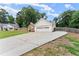 Charming single-story home featuring a brick facade, white siding, and a well-manicured lawn at 2605 Fort Apachee Trl, Dacula, GA 30019