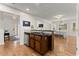 Kitchen with granite countertops and stainless steel dishwasher, offering easy access to the dining room at 2605 Fort Apachee Trl, Dacula, GA 30019