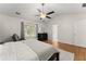 Spacious main bedroom with hardwood floors, vaulted ceiling, and natural light at 2605 Fort Apachee Trl, Dacula, GA 30019