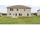 Back exterior of home showing siding, windows and large backyard at 120 Aj Welch Jr Way, Mcdonough, GA 30252