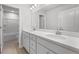 Elegant bathroom featuring double sinks, quartz counters and a tub-shower combination at 120 Aj Welch Jr Way, Mcdonough, GA 30252