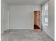 Spacious bedroom with neutral carpet, natural light from the window, and access to closet and bathroom at 3360 Pickens St, Duluth, GA 30096
