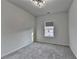 Bedroom featuring neutral walls, plush carpet and a window providing natural light at 3360 Pickens St, Duluth, GA 30096