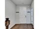Entryway featuring hardwood floors, white trim and neutral paint at 3360 Pickens St, Duluth, GA 30096