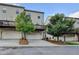 Exterior view of a two-story townhome with a deck above the garage at 3360 Pickens St, Duluth, GA 30096